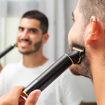 InnovaGoods Professionell uppladdningsbar hårtrimmer med tillbehör Triher Svart rostfritt stål